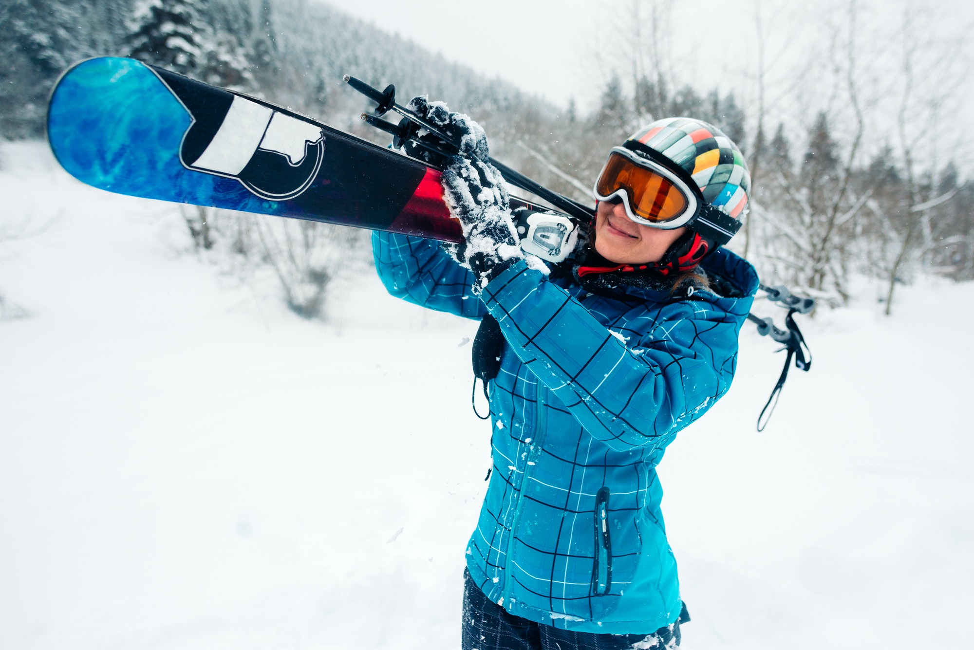 girl go with ski equpment in ski touring